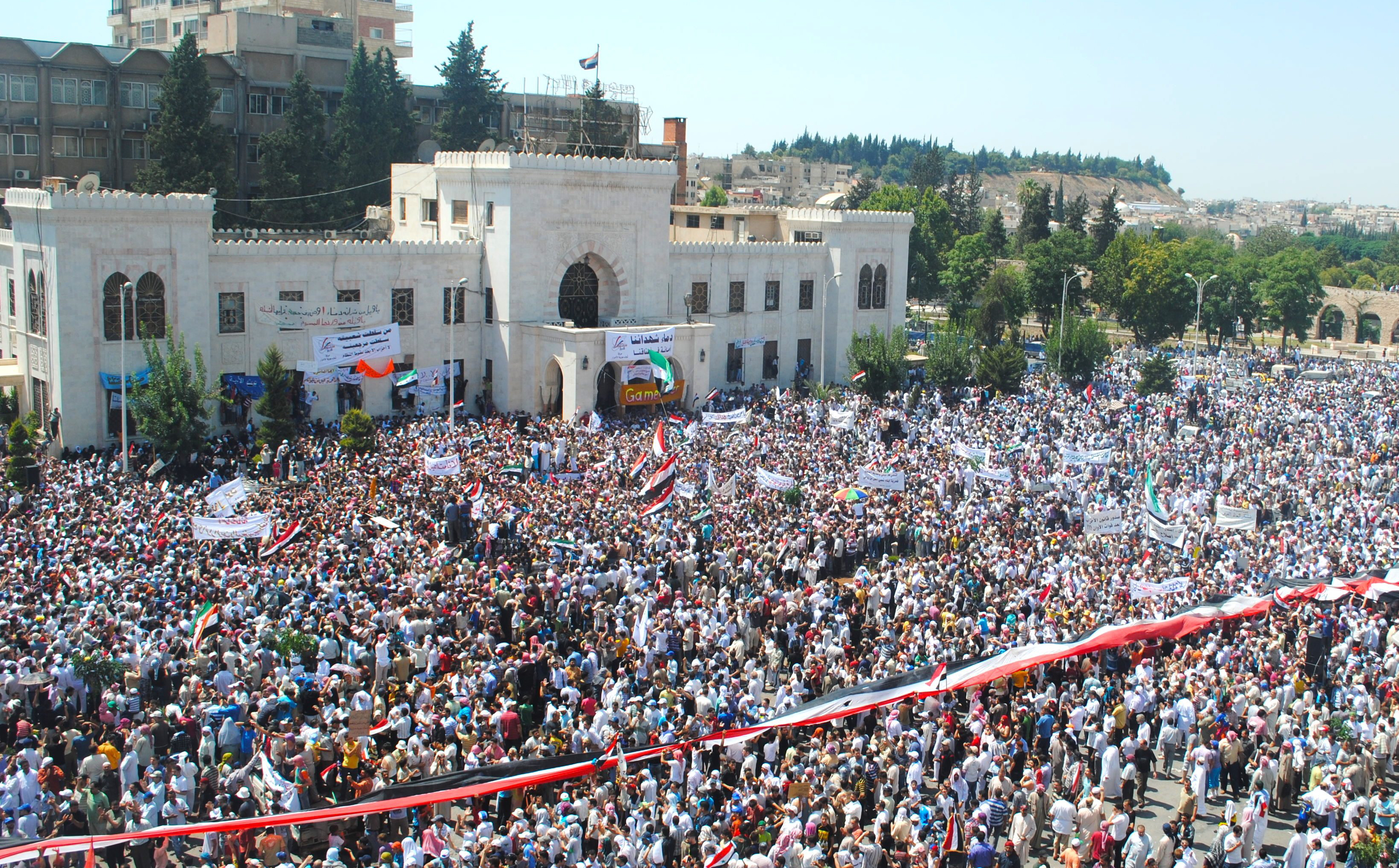 a-large-crowd-protests-in-syrian-town-of-hama-data.jpg